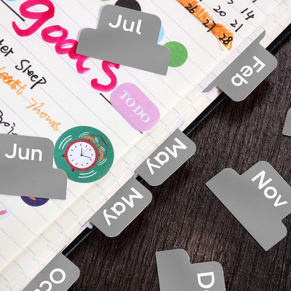 Outus 24 Pieces Monthly Adhesive Tabs for Planner - Designer Accessories Monthly Tabs Stickers Decorative for Office Planners Organizations Sturdy Notebook Planners Journal(Black)